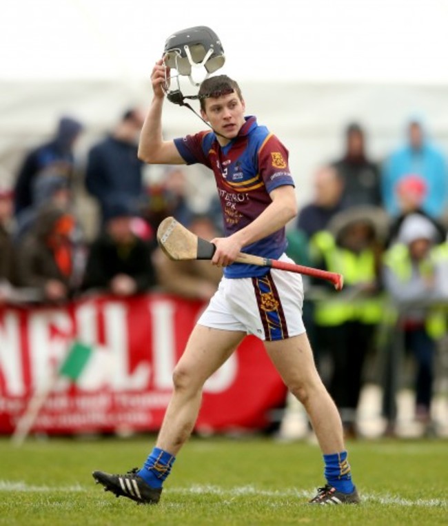 Jack Browne dejected after being sent off