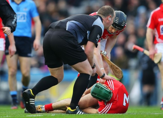 Alan Kelly and Shane O'Neill check on Christopher Joyce