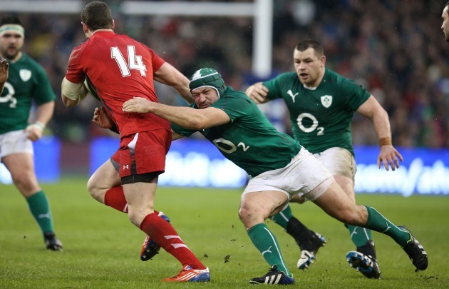 Alex Cuthbert is tackled by Rory Best