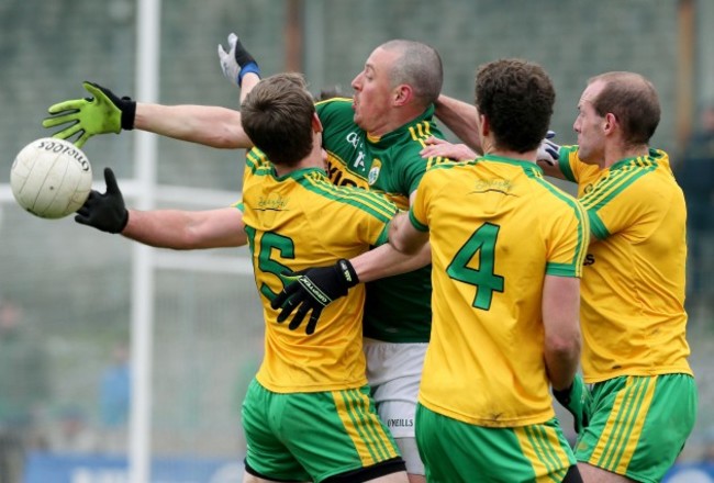 Kerry's Kieran Donaghy under pressure from the Donegal defence