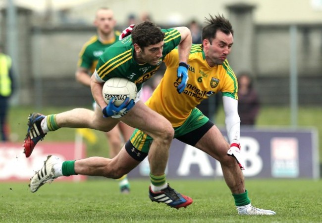 Killian Young tackled by Karl Lacey