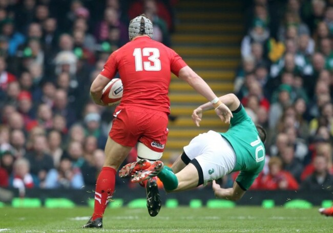 Jonathan Sexton handed off by Jonathan Davies