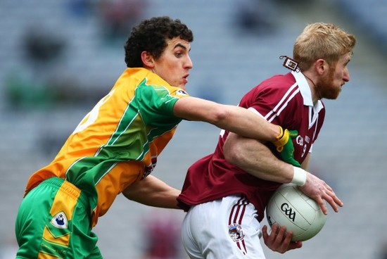 Daithi Burke tackles Paudie McGuigan