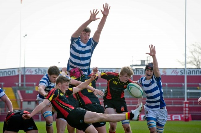 Hugh Bourke clears the ball