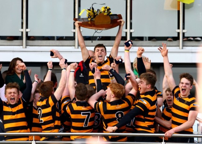 Lewis McNamara lifts the cup