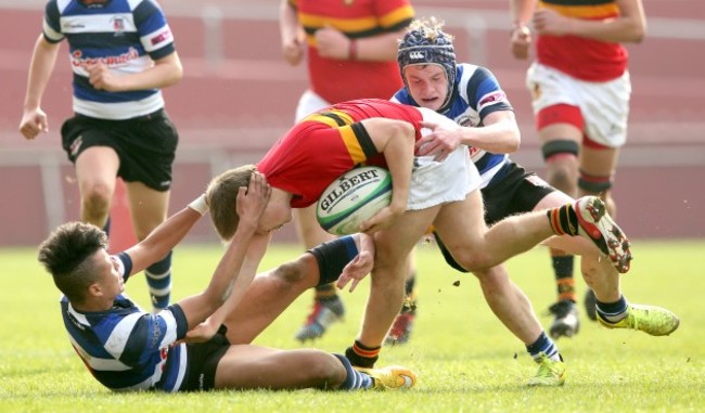 Conor Phillips and Conor Dennehy tackle Colin Sisk