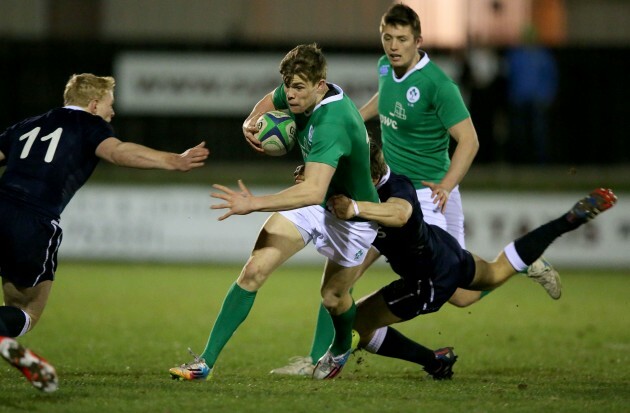 Garry Ringrose tackled by Ben Rogers and Alec Coombes