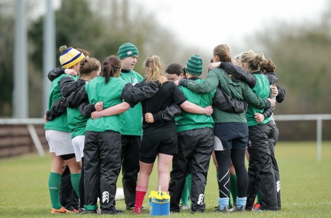 Tom Tierney talks to the backs