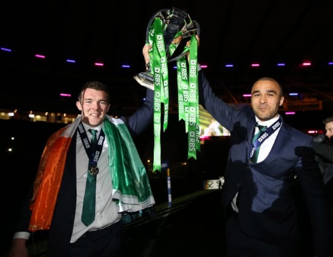 Peter O'Mahony and Conor Murray celebrate with the trophy