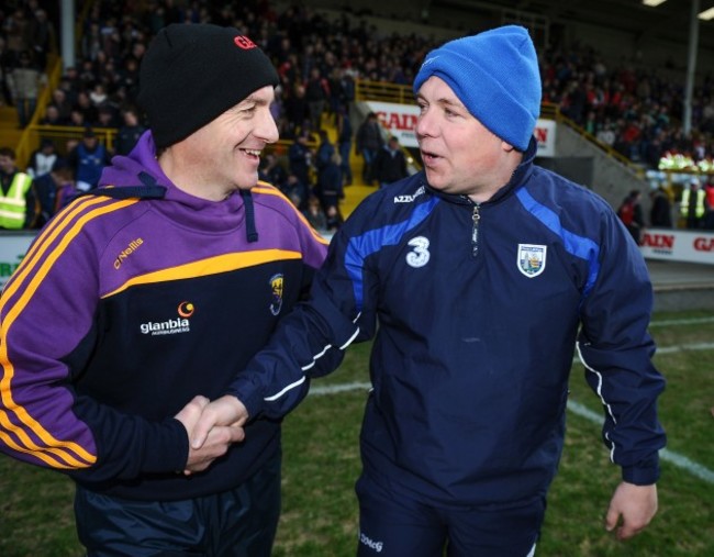 Liam Dunne and Derek McGrath shake hands after the game