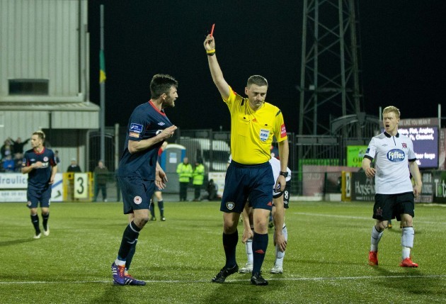Killian Brennan is shown a red card by Paul McLaughlin
