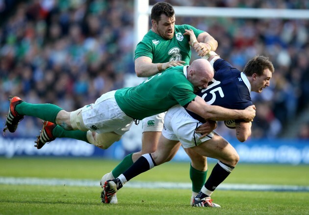 Paul O'Connell and Cian Healy tackle Stuart Hogg