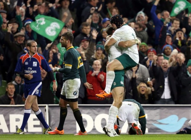 Tommy Bowe celebrates his try with Richardt Strauss