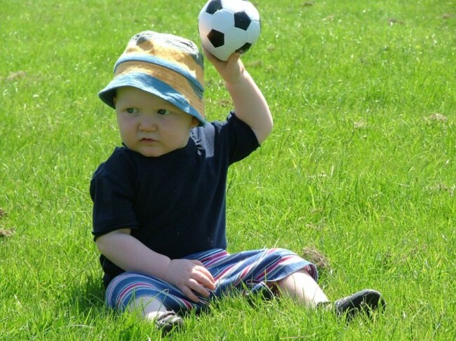 Toddler with ball