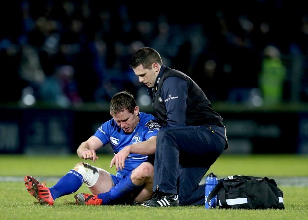 Eoin Reddan receives treatment before going off injured