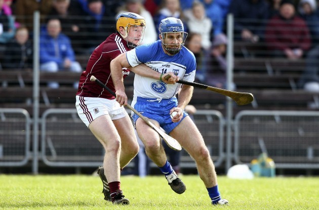 Michael Walsh in action against Paul Killeen