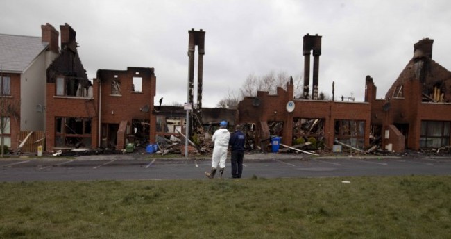 Newbridge Fire. Chimney stacks rise abov