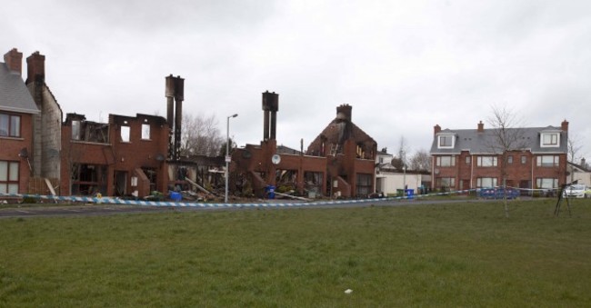 Newbridge Fire. Chimney stacks rise abov