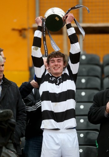James Maher lifts the cup