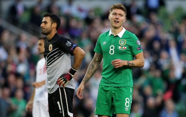 Jeff Hendrick looks on as goalkeeper Jordan Perez reacts to scoring an own goal