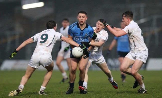 Cormac Costello under pressure from the Kildare defence