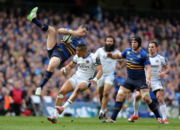 Rob Kearney is challenged in the air by Anthony Watson