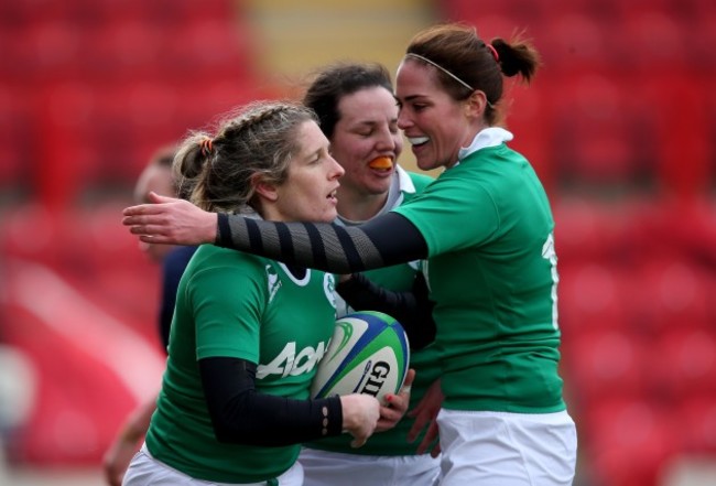 Alison Miller celebrates her try with Nora Stapleton and Paul Fitzpatrick