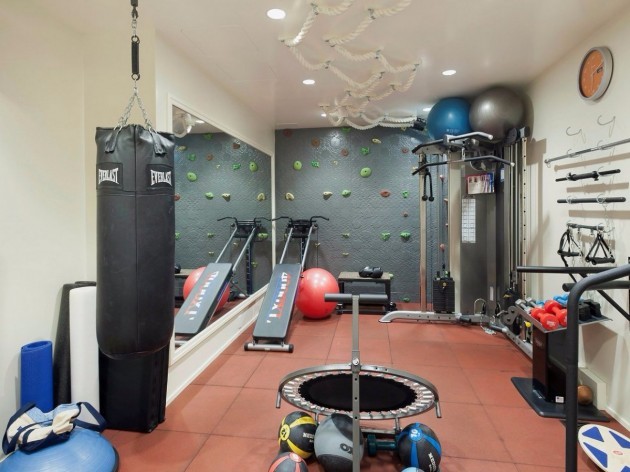 their-gym-includes-a-rock-climbing-wall