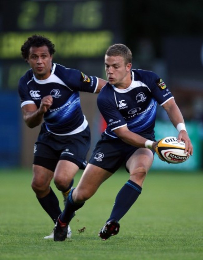 Ian Madigan offloads to Isa Nacewa