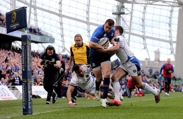 Zane Kirchner is held up just short of the try line by Anthony Watson and George Ford