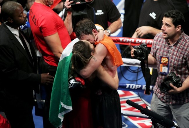 Andy Lee celebrates winning with his wife