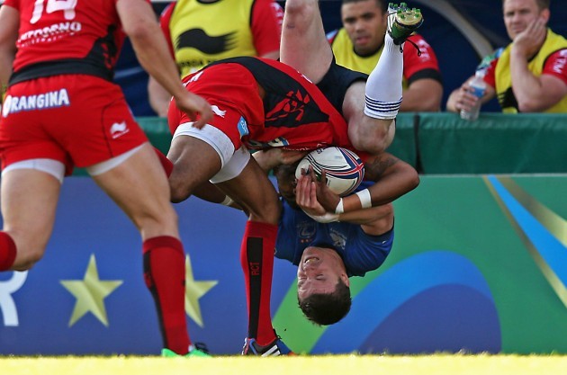 Brian O'Driscoll gets upended by Delon Armitage