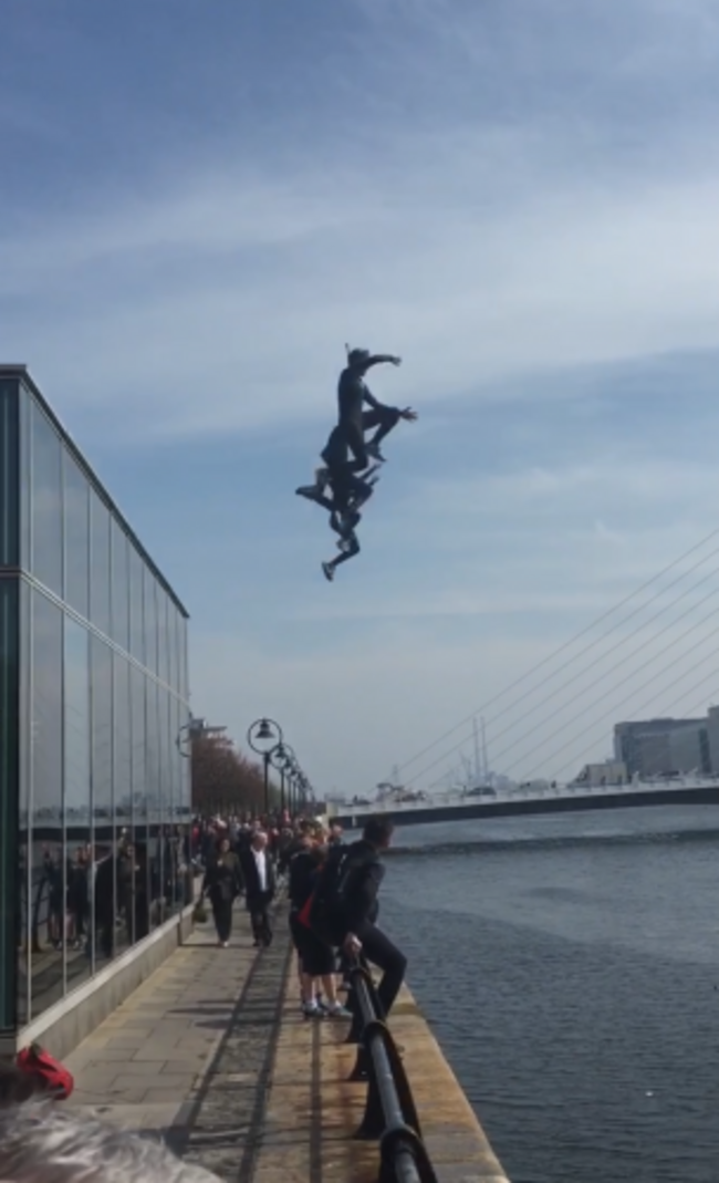 boys jumping into the liffey