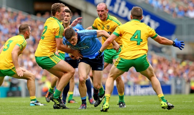 Eamonn McGee, Neil Gallagher and Paddy McGrath tackle Diarmuid Connolly