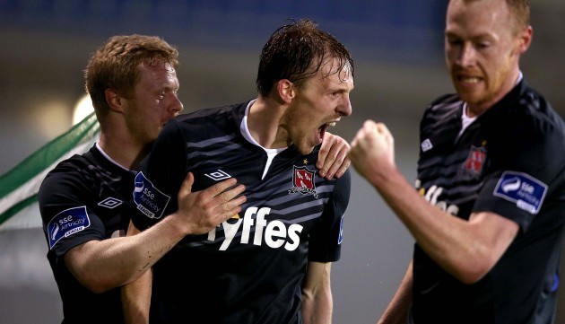 David McMillan celebrates scoring the first goal of the game with Chris Shields and Daryl Horgan