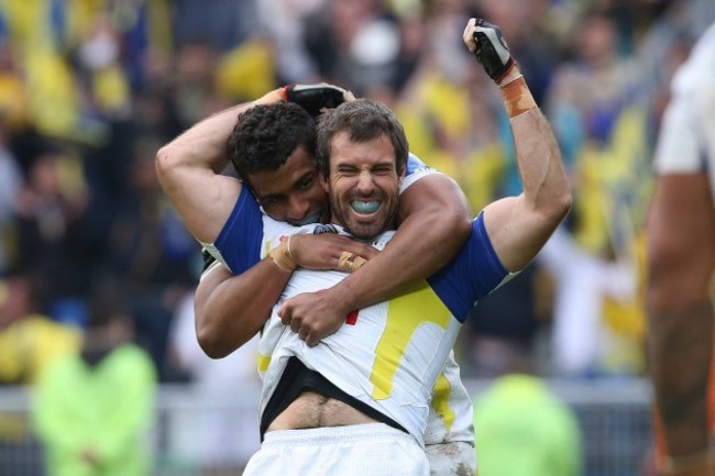 Wesley Fofana and Brock James celebrate