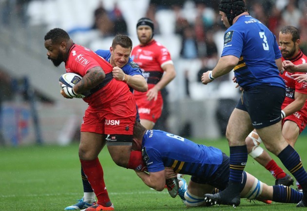 Mathieu Bastareaud is tackled by Jimmy Gopperth and Jordi Murphy