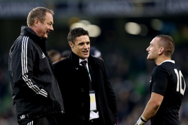 Mike Byrne and Dan Carter speak with Aaron Cruden after the game