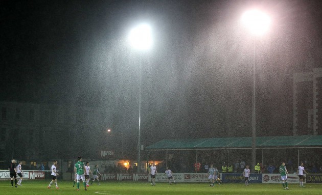 Geberal view of a downpour during the game