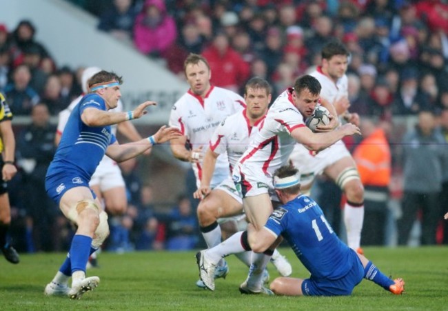 Tommy Bowe is tackled by Luke Fitzgerald