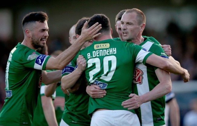 Billy Dennehy celebrates scoring the first goal of the game with teammates