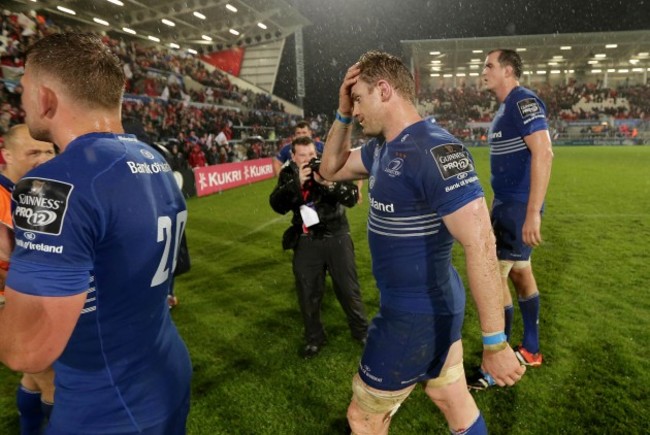 A dejected Jamie Heaslip and teammates leave the field