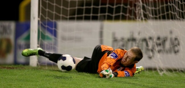 Dean Delany saves a penalty but is beaten on the rebound