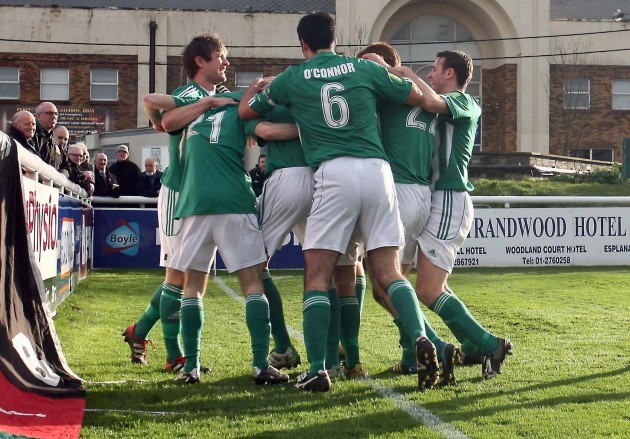Kieran Marty Waters of Bray is mobbed by team mates after scoring the first goal of the game