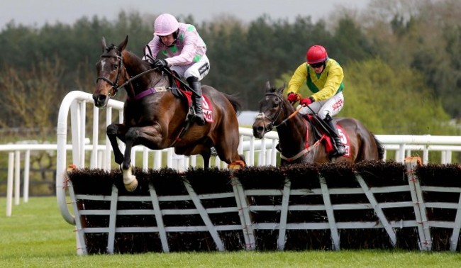 Douvan ridden by Ruby Walsh clears the last fence on the way to winning