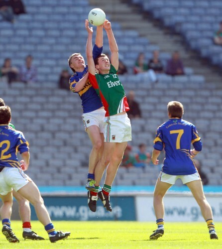 Diarmuid O'Connor and Colman Kennedy compete for the ball