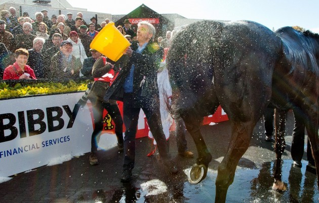 Michael O'Leary pretends to throw water on racegoers