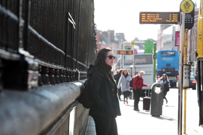 Commuters at bus stops on the day before