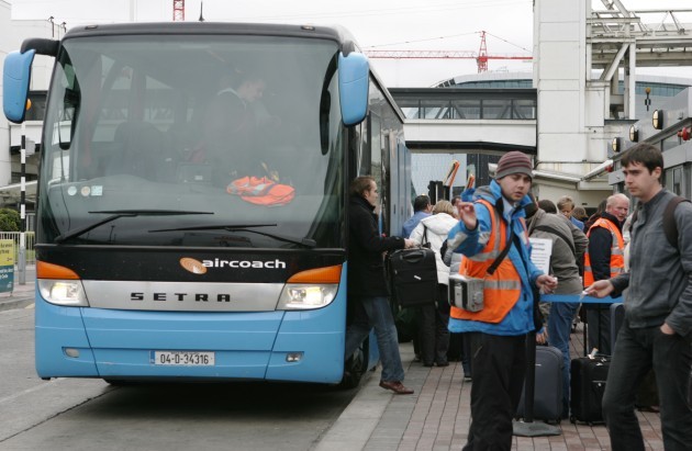 People board a Aircoach Bus at Dublin Ai