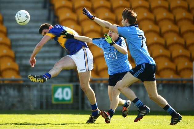 Colin O'Riordan under pressure from Eoin Murchan and Ross McGowan